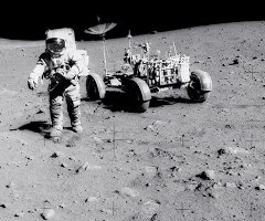 Scott beside the Apollo 15 Luanr Rover