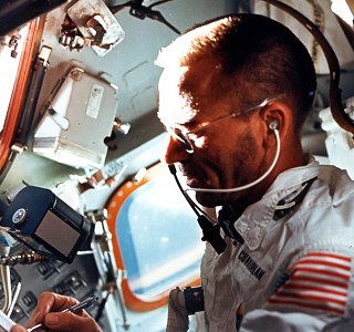 Cunningham using a Fisher AG-7 pen on Apollo 7